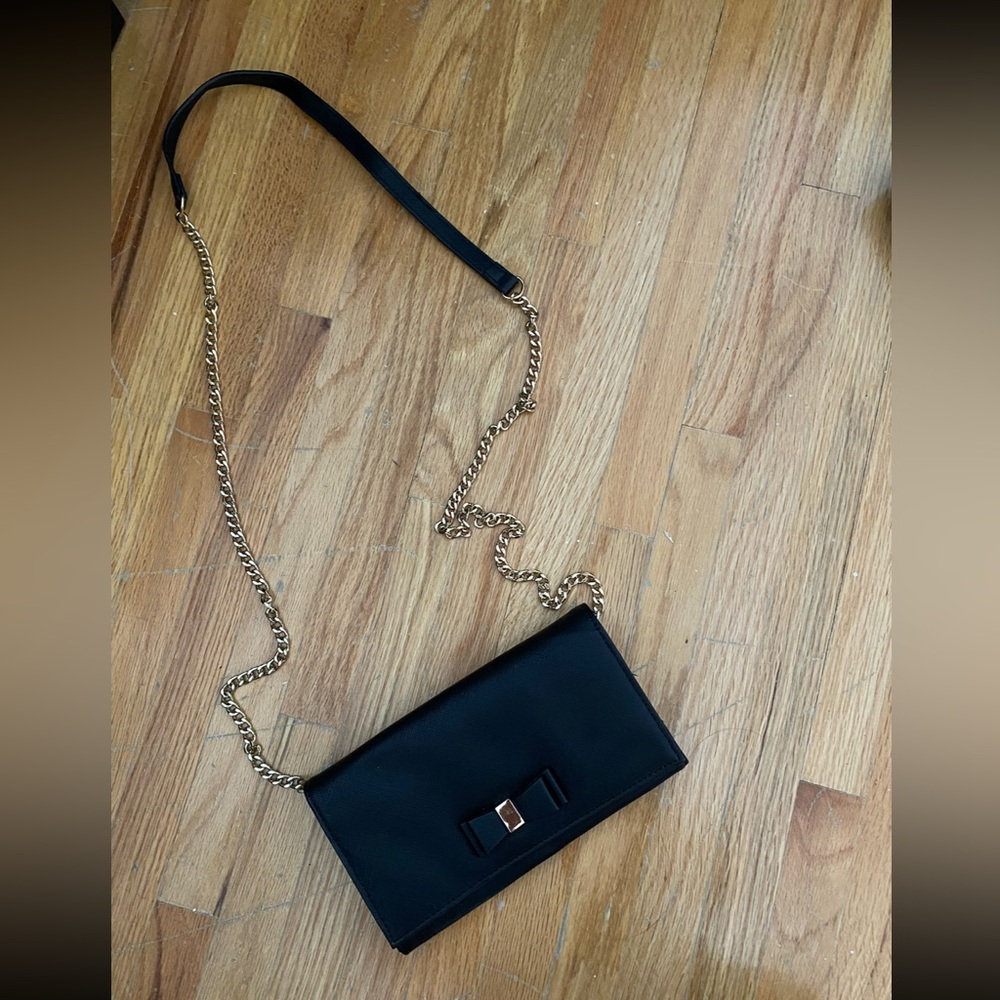 Black bag with a bow